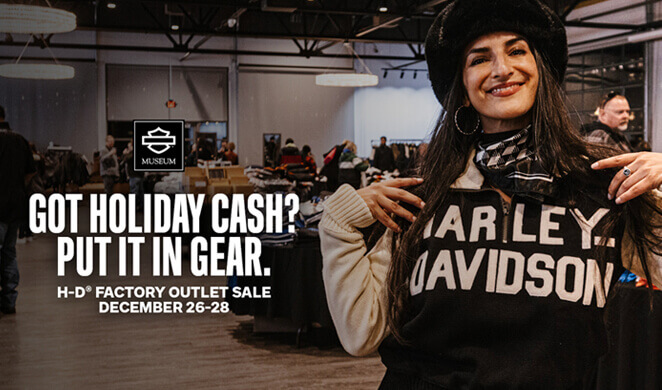 happy shopper holding shirt