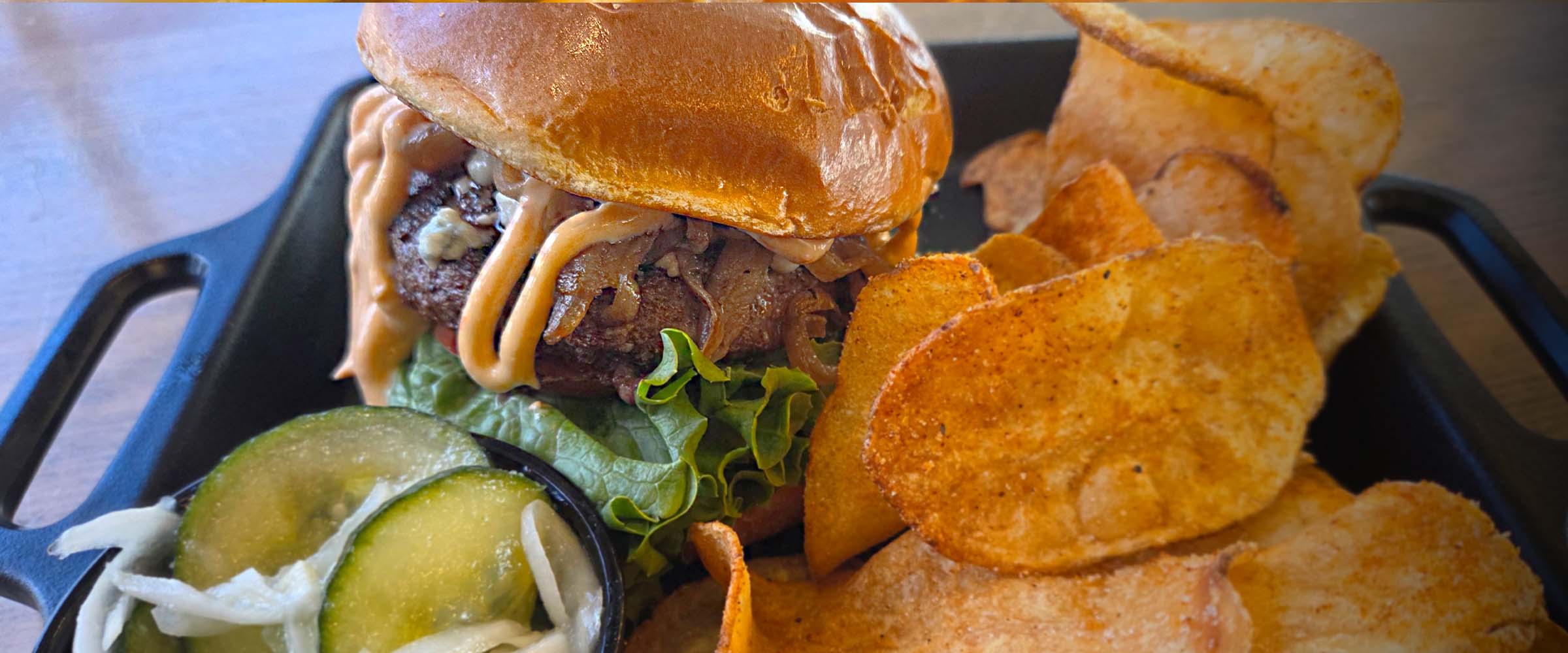 Black & Bleu Burger on a tray - desktop version